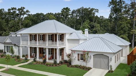 metal roof on a white house|white house with galvalume roof.